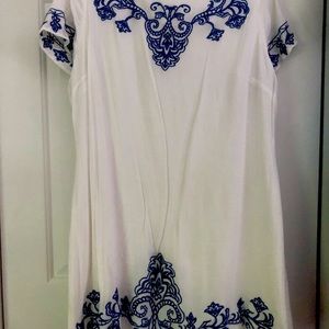 White with blue embroidery knee length dress from Lulu’s
